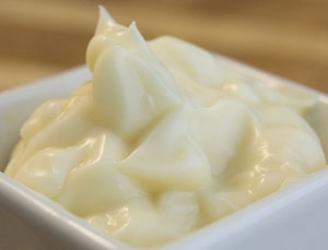 photo of a square white bowl filled with mayonnaise